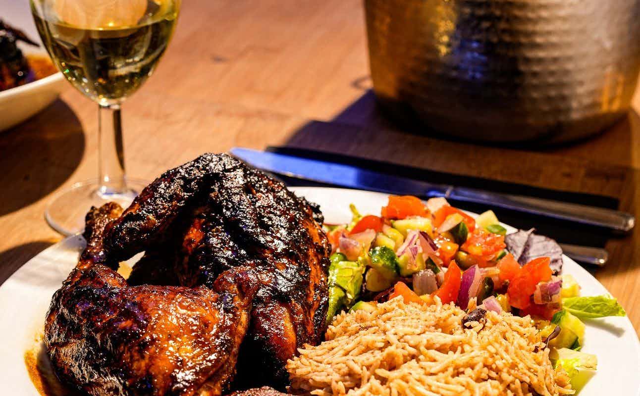 Enjoy Halal, Caribbean, Vegetarian options, Halal, Vegan Options, Restaurant, Street Parking, Table service, Free Wifi, Wheelchair accessible, Highchairs available, Private Dining, Indoor & Outdoor Seating, $$, Groups, Families and Kids cuisine at Guanabana in Camden, London