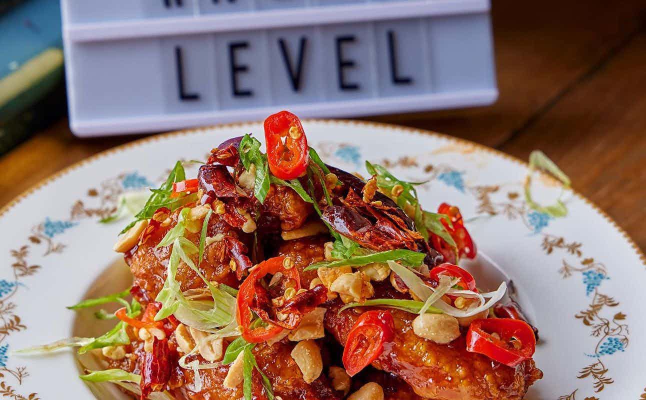 Enjoy American, Korean, Asian, Vegetarian options, Restaurant, Free Wifi, $$, Families and Groups cuisine at Chick 'N' Sours Seven Dials in Covent Garden, London