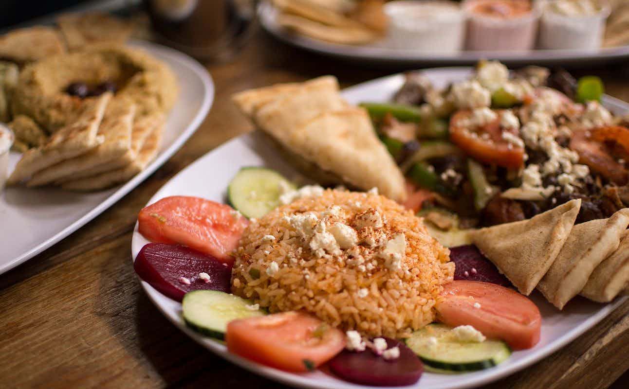 Enjoy Greek, Mediterranean, Vegetarian options, Vegan Options, Gluten Free Options, Restaurant, Bars & Pubs, $$, Live music, Families and Groups cuisine at Bouzouki By Night in Manchester City Centre, Manchester