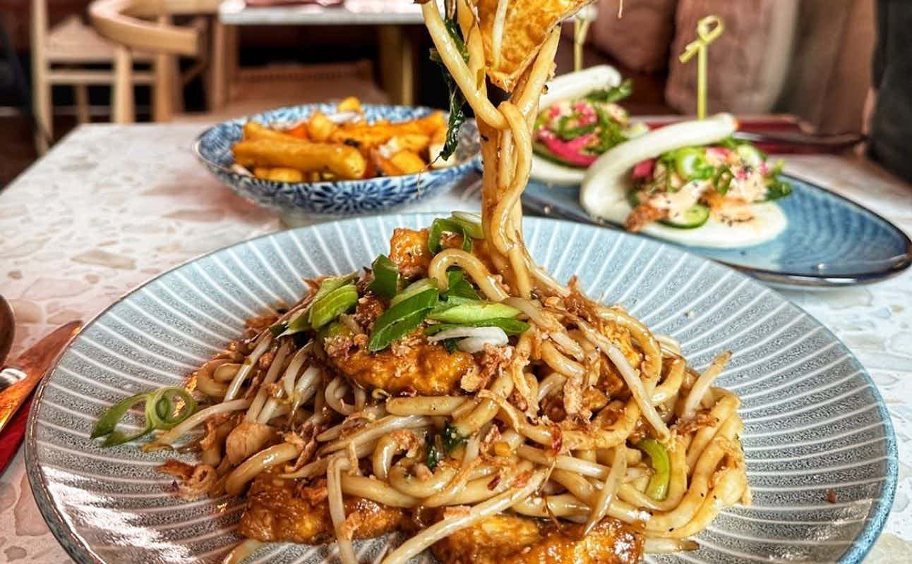 Enjoy Asian, Vegan Options, Gluten Free Options, Restaurant, Indoor & Outdoor Seating, Street Parking, Non-smoking, Private Dining, Highchairs available, Dog friendly, $$$ and Groups cuisine at Suki Suki Street Food & Bar in Deansgate, Manchester
