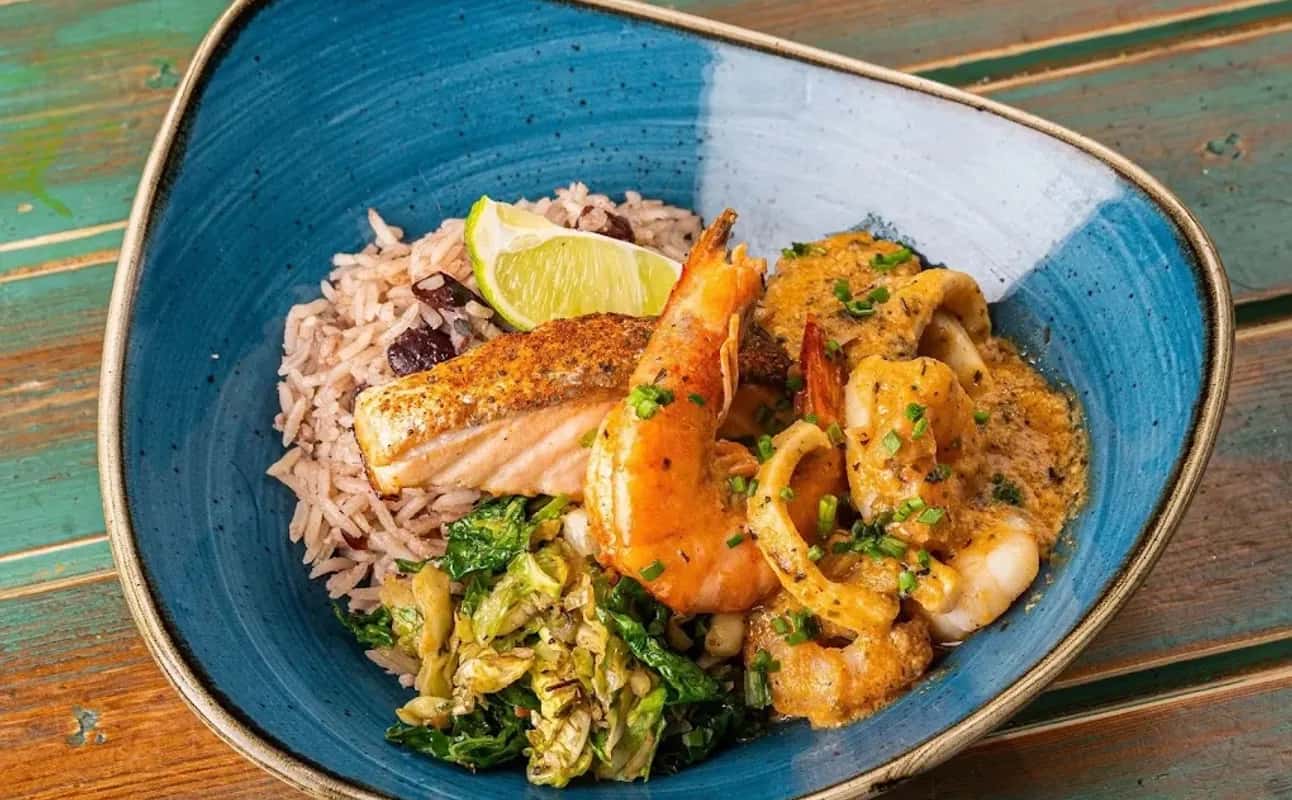 Enjoy Jamaican, Caribbean, Vegan options, Gluten Free options, Restaurant, Dog friendly, Free wifi, Highchairs available, Indoor & outdoor seating, Table service, $$, Groups, Special occasion, Families and Date night cuisine at Turtle Bay Leicester in Leicester City Centre, Leicester