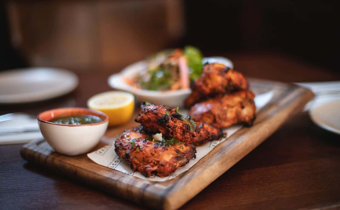 Enjoy British, Indian, Vegetarian options, Vegan options, Hotel restaurant, Gastropub, Bars & pubs, Indoor & outdoor seating, Dog friendly, Free wifi, Wheelchair accessible, Table service, $$, Special occasion, Groups, Live music and Families cuisine at Three Falcons Indian Gastropub in St John's Wood, London
