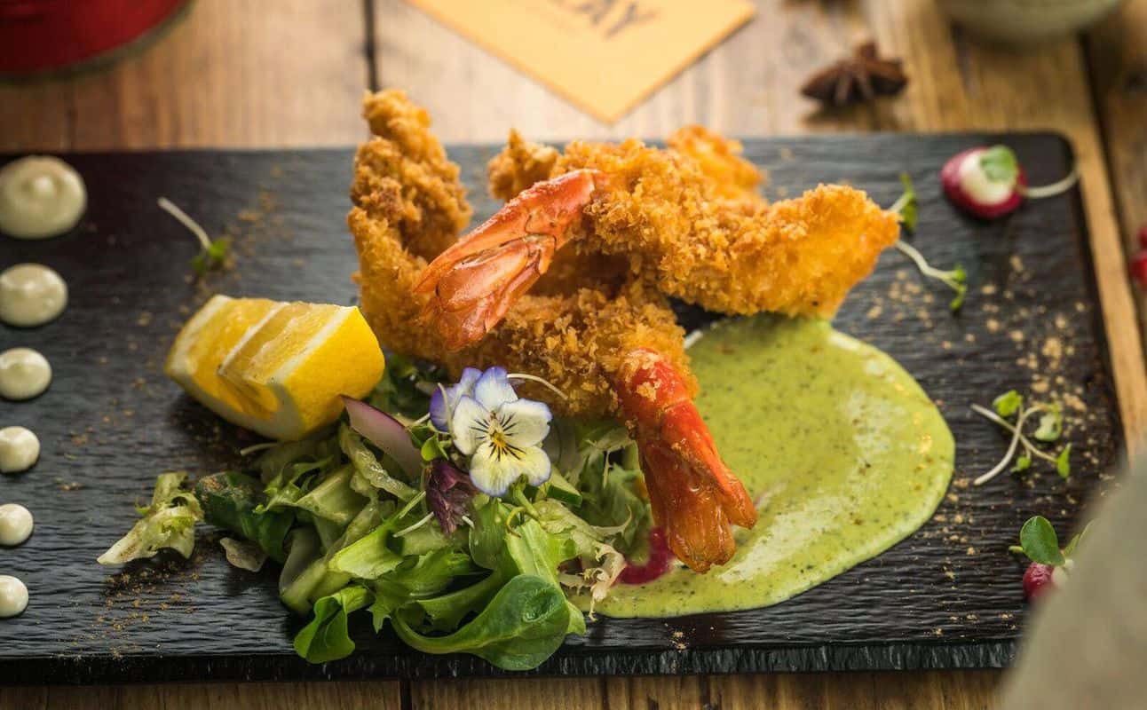 Enjoy Indian, Street food, Gluten Free options, Vegan options, Vegetarian options, Restaurant, Indoor & outdoor seating, $$, Groups and Families cuisine at Bandook in Wapping Wharf, Bristol