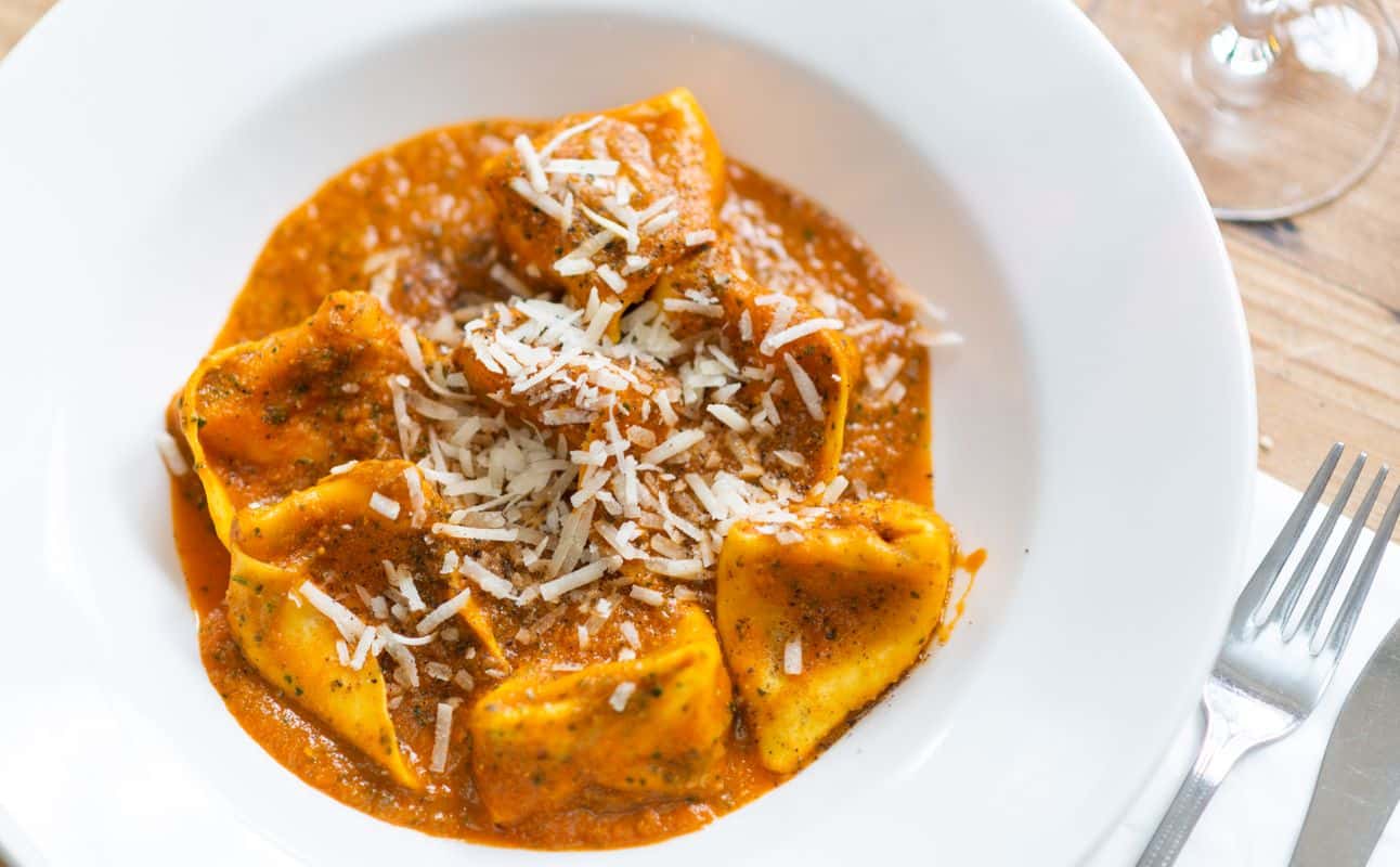 Enjoy British and Vegetarian cuisine at Hugo's Restaurant in Queen's Park, London