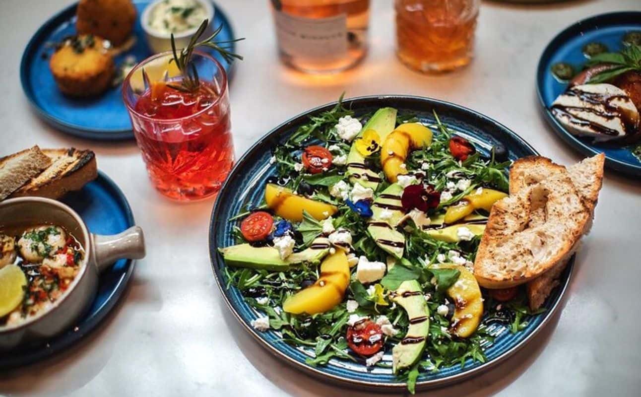 Enjoy British, Mediterranean, Vegan options, Vegetarian options, Restaurant, Indoor & outdoor seating, Street parking, Highchairs available, Free wifi, $$, Families and Groups cuisine at Village Brasserie in Manchester City Centre, Manchester