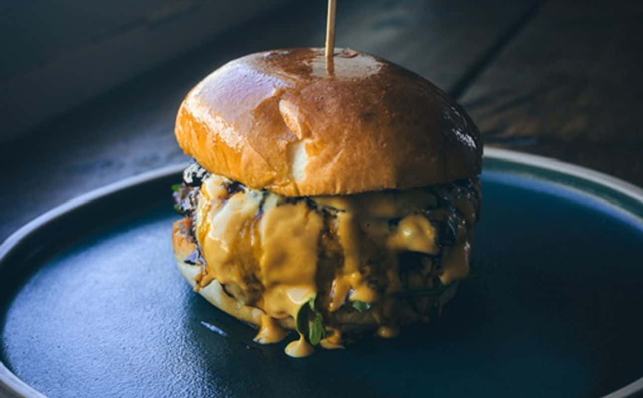 Enjoy Pub Food, British, Gluten Free options, Vegan options, Vegetarian options, Restaurant, Bars & pubs, Highchairs available, Beer garden, Street parking, Indoor & outdoor seating, Non-smoking, Free wifi, Dog friendly, $$, Live music, Groups, Families and Date night cuisine at The Prestonville Arms in Brighton City Centre, Brighton