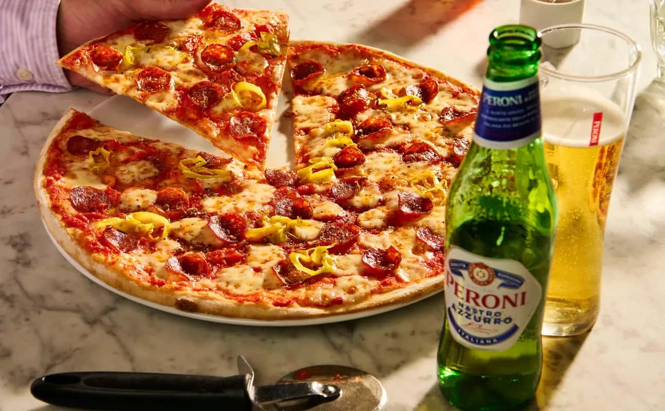 Enjoy Italian, Pizza, Casual dining, Gluten Free options, Vegan options, Vegetarian options, Dairy free options, Restaurant, Free wifi, Table service, Wheelchair accessible, Indoor & outdoor seating, $$, Groups, Families and Date night cuisine at PizzaExpress Speke in Speke, Liverpool