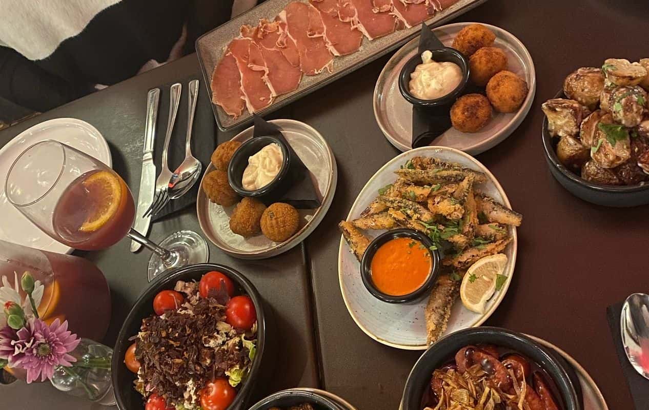Enjoy Spanish, Vegetarian options, Gluten Free options, Restaurant, Free wifi, Indoor & outdoor seating, Table service, $$, Groups and Families cuisine at La Raza in Cambridge City Centre, Cambridge
