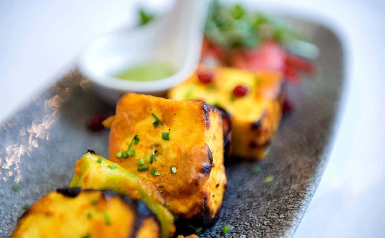 Enjoy Indian cuisine at Infuse Modern Indian Bistro in St Albans, London