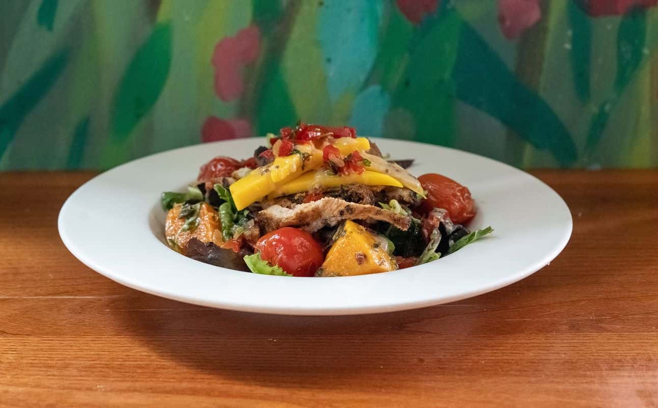 Enjoy Caribbean cuisine at Cottons Camden in Camden, London