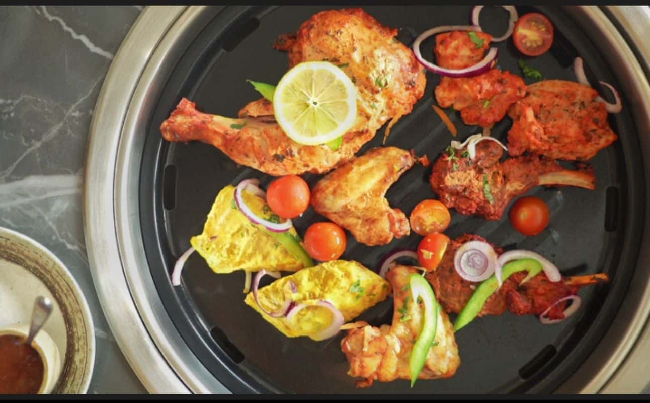 Enjoy Indian, Breakfast, Brunch, Vegetarian options, Vegan options, Restaurant, Cocktail bar, Indoor & outdoor seating, $$, Families, Groups and Live music cuisine at Haveli Grill & Lounge in Slough, London