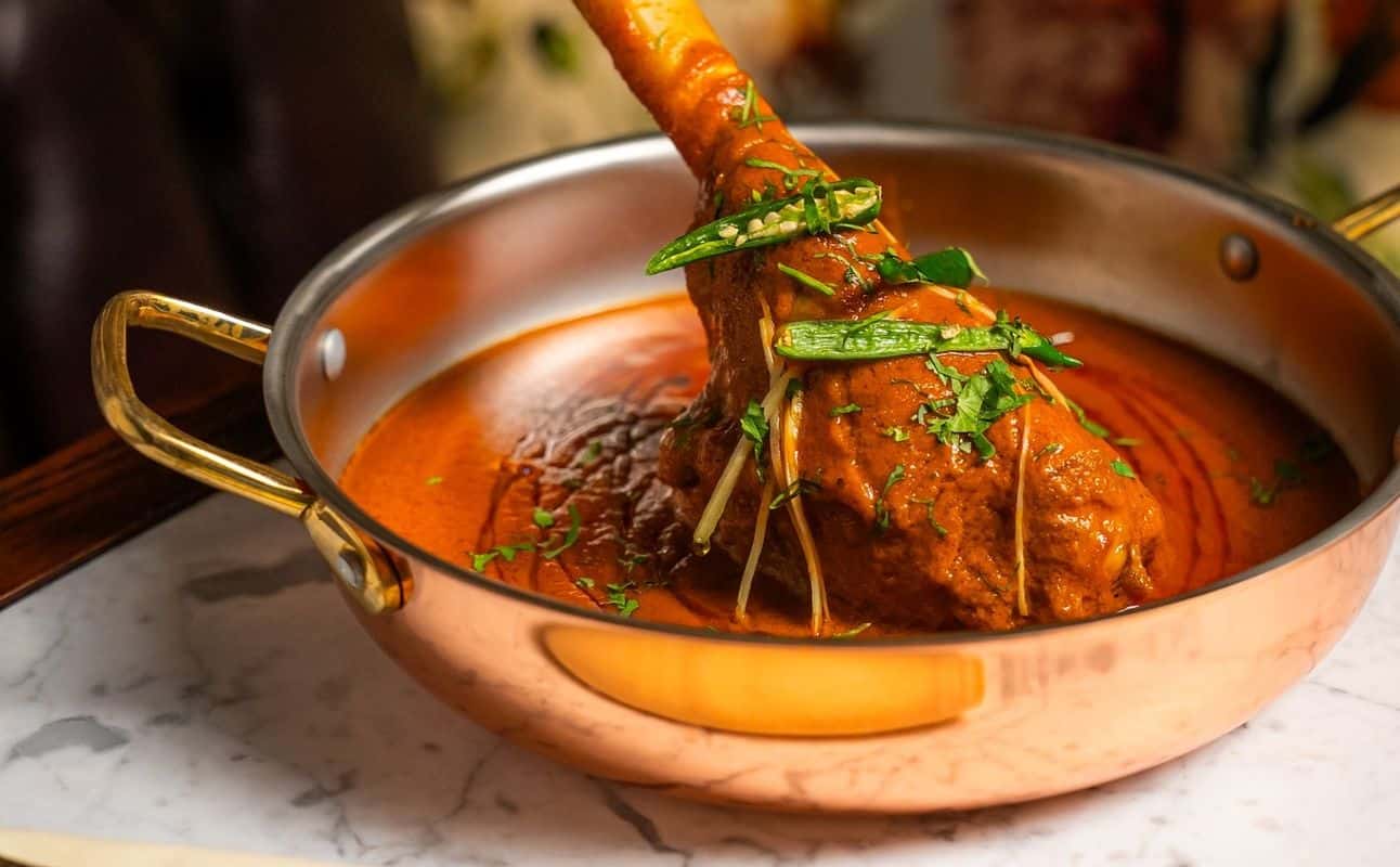 Enjoy Indian, Gluten Free options, Vegan options, Restaurant, Indoor & outdoor seating, Highchairs available, $$, Families, Wine bar, Date night, Groups and Hidden gems cuisine at RAAZ Modern Indian in Putney, London