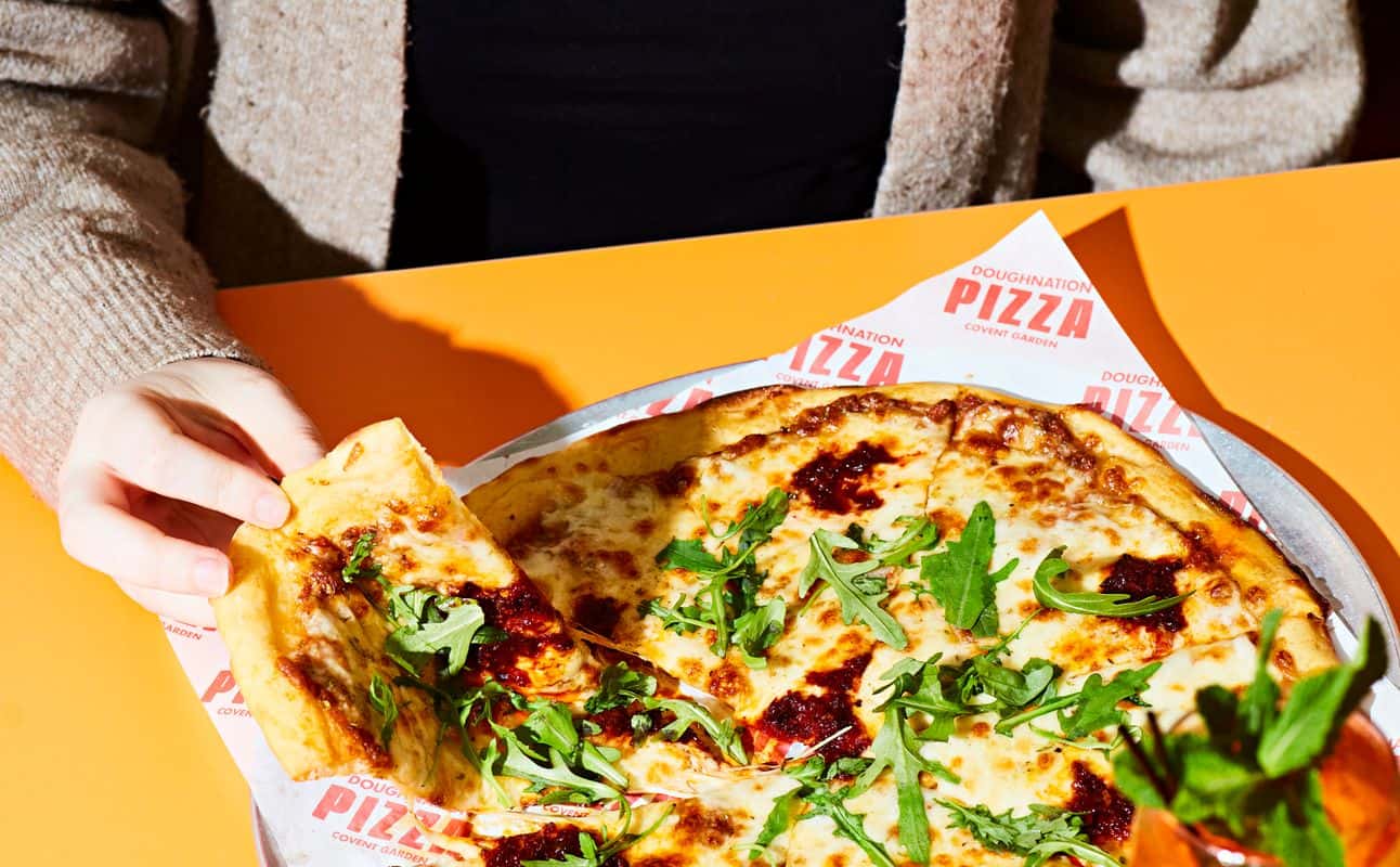 Enjoy Pizza, Gluten Free options, Vegan options, Restaurant, Dog friendly, Wheelchair accessible, Child friendly, Table service, Free wifi, Beer garden, $$, Families, Views, Kids and Date night cuisine at Doughnation Pizza in Covent Garden, London