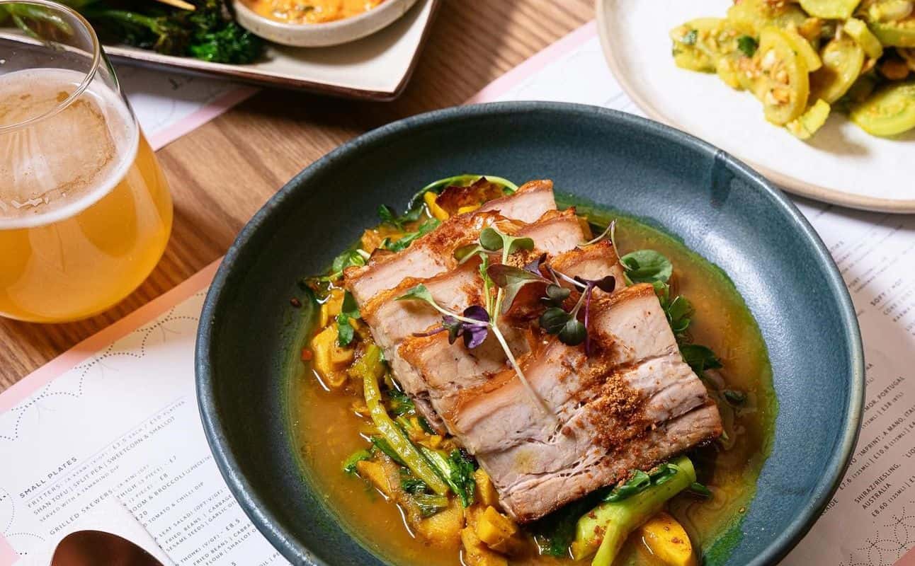 Enjoy Burmese, Gluten Free options, Vegan options, Vegetarian options, Restaurant, Indoor & outdoor seating, Wheelchair accessible, Free wifi, Table service, Non-smoking, $$, Families and Groups cuisine at Lahpet Covent Garden in Covent Garden, London