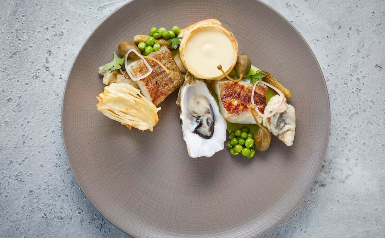 Enjoy British cuisine at M Bar & Grill in Twickenham, London