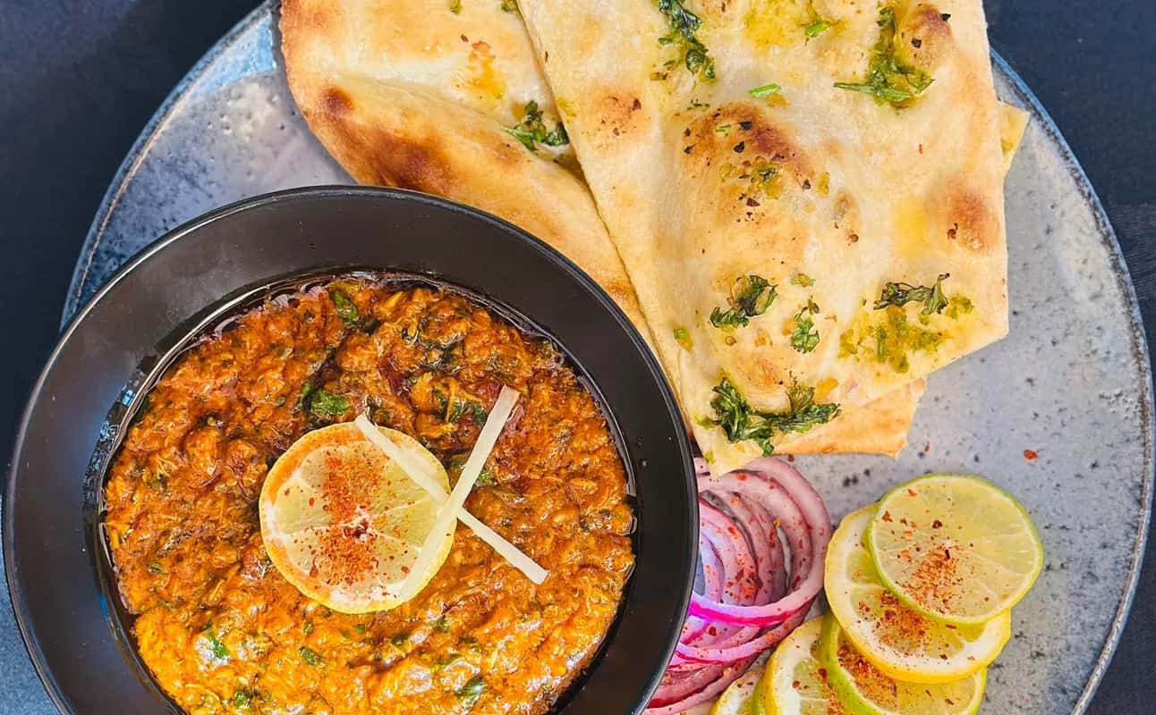 Enjoy Indian, Gluten Free options, Vegan options, Vegetarian options, Restaurant, Dog friendly, Highchairs available, Private dining, Street parking, Table service, $$, Groups and Families cuisine at The Lansdowne Indian Restaurant & Bar in West End, Glasgow