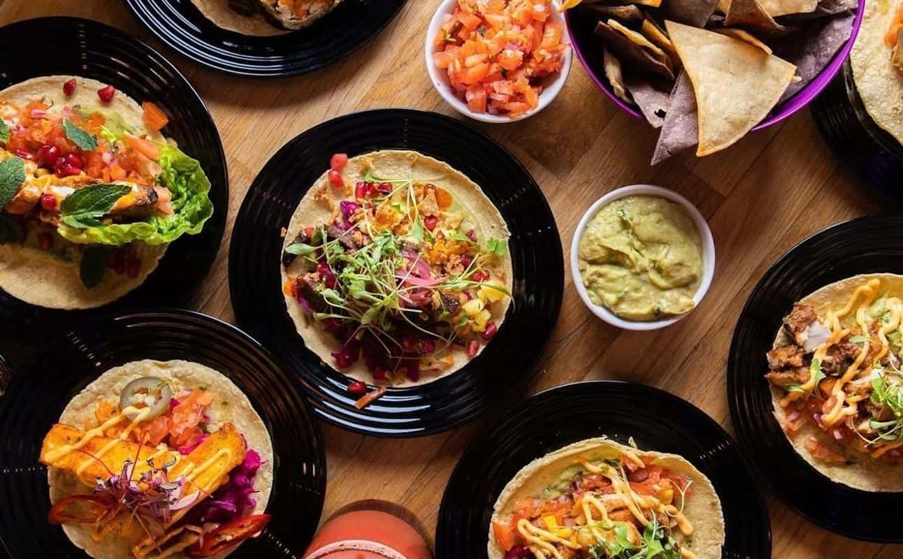 Enjoy Mexican, Vegetarian options, Cocktail bar, Restaurant, Child friendly, Free wifi, Table service, $$, Groups, Bar scene and Families cuisine at Holy Guacamoly in Tooting, London