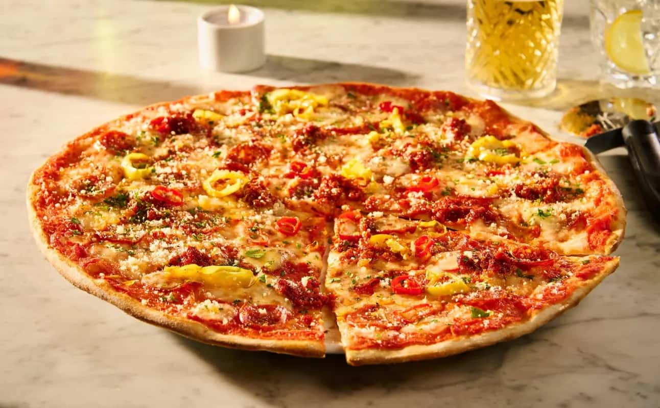 Enjoy Pizza, Casual dining, Italian, Vegetarian options, Vegan options, Gluten Free options, Dairy free options, Restaurant, Highchairs available, Wheelchair accessible, Table service, Indoor & outdoor seating, Non-smoking, Free wifi, $$, Families, Groups and Date night cuisine at PizzaExpress Baxter Gate in Loughborough, Leicester