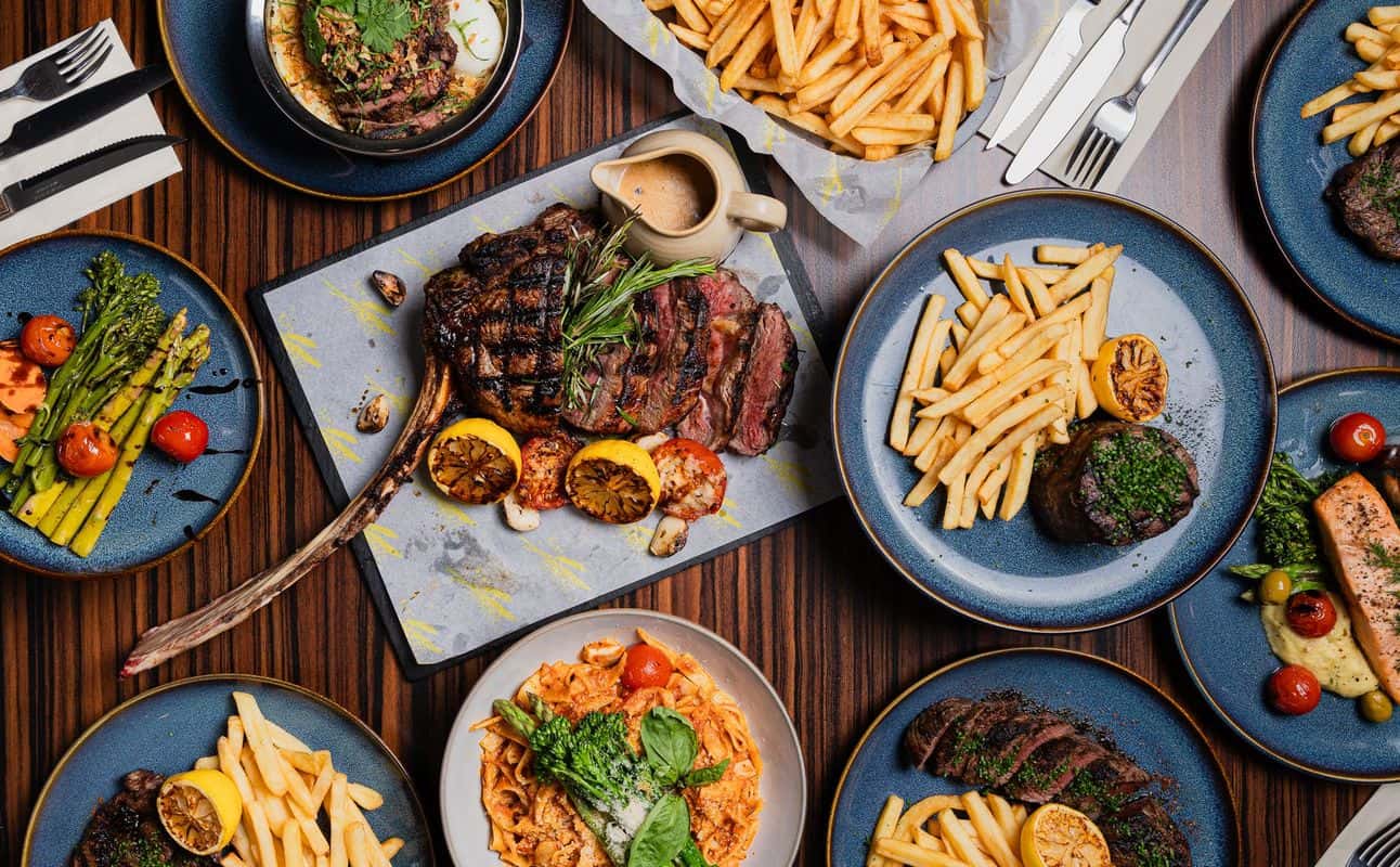 Enjoy Steakhouse, Gluten Free options, Vegetarian options, Restaurant, Sports bar, Private dining, Highchairs available, Free wifi, Table service, Non-smoking, $$, Families, Live music and Groups cuisine at Signature Steakhouse in Old Trafford, Manchester
