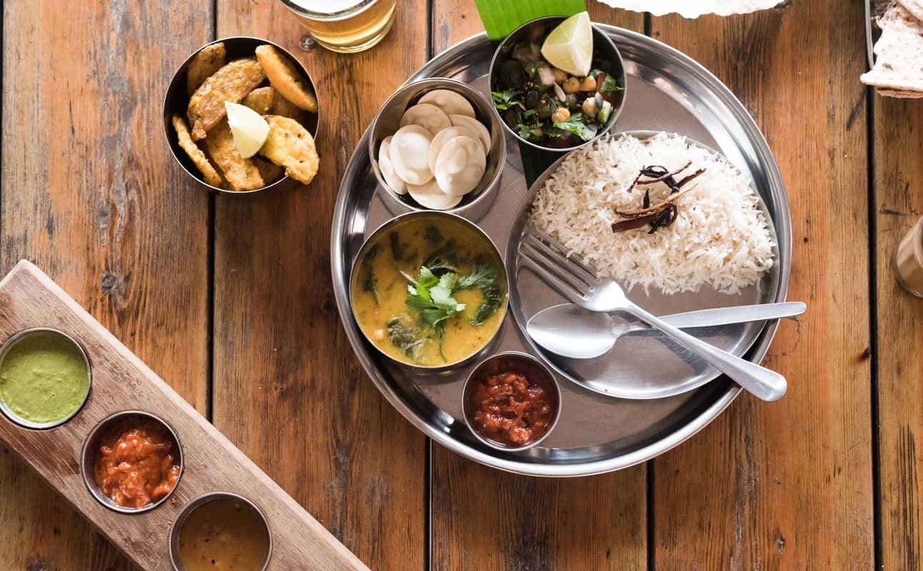 Enjoy South Indian, Gluten Free options, Vegan options, Vegetarian options, Restaurant, Indoor & outdoor seating, Free wifi, Highchairs available, Wheelchair accessible, Table service, Street parking, $$, Groups, Families, Business meetings and Special occasion cuisine at Thali in Easton, Bristol