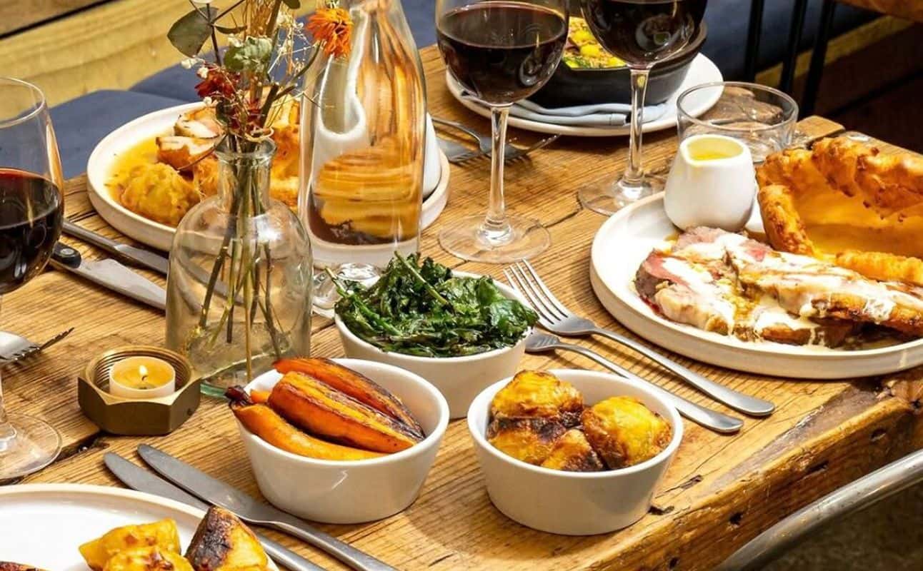 Enjoy Burgers, Vegan options, Gluten Free options, Restaurant, Bars & pubs, Beer garden, Waterfront, Indoor & outdoor seating, Free wifi, Dog friendly, Child friendly, $$, Families, Groups and All patrons under 18 must be accompanied by a parent or legal guardian. cuisine at The Gardens at Barge East in Hackney Wick, London