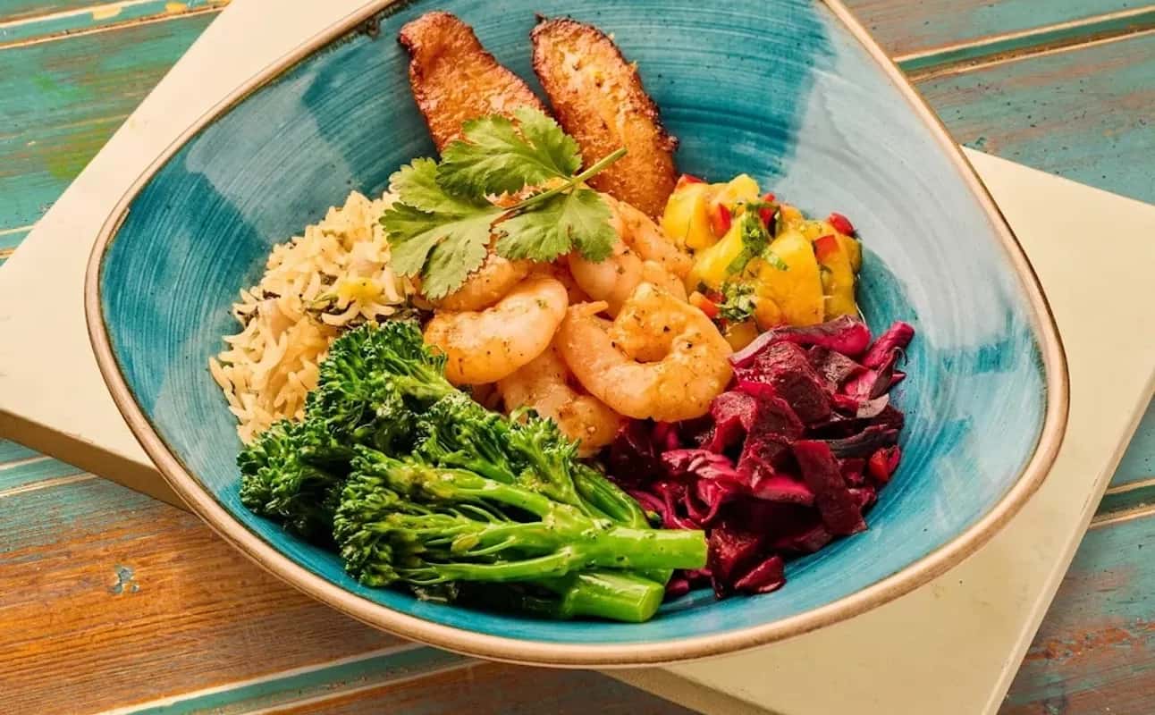 Enjoy Jamaican, Caribbean, Vegan options, Gluten Free options, Restaurant, Dog friendly, Table service, Highchairs available, Wheelchair accessible, Indoor & outdoor seating, $$, Families, Groups, Special occasion and Date night cuisine at Turtle Bay Brindleyplace in Brindleyplace, Birmingham