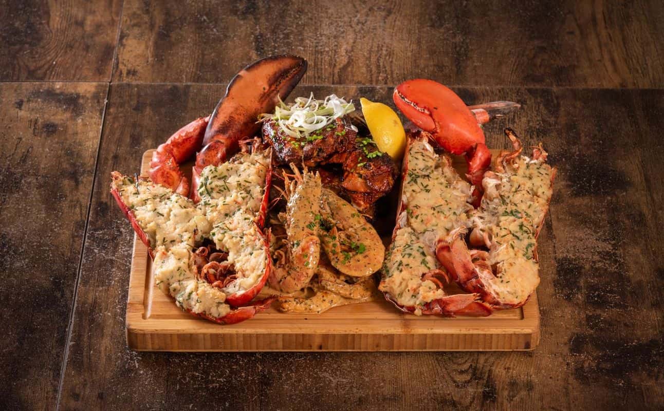 Enjoy American, International, Gluten Free options, Bars & pubs, Late night, Table service, $$, Live music and Groups cuisine at Dell Boyz American Diner & Bar in Tooting, London