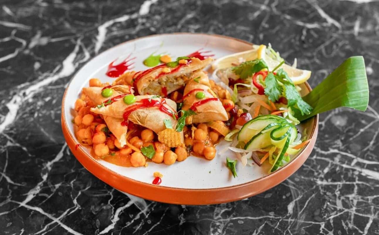 Enjoy Indian, Asian, Gluten Free options, Vegan options, Vegetarian options, Restaurant, Free wifi, Street parking, Table service, $$, Groups and Families cuisine at Blossom by Khans in Battersea, London