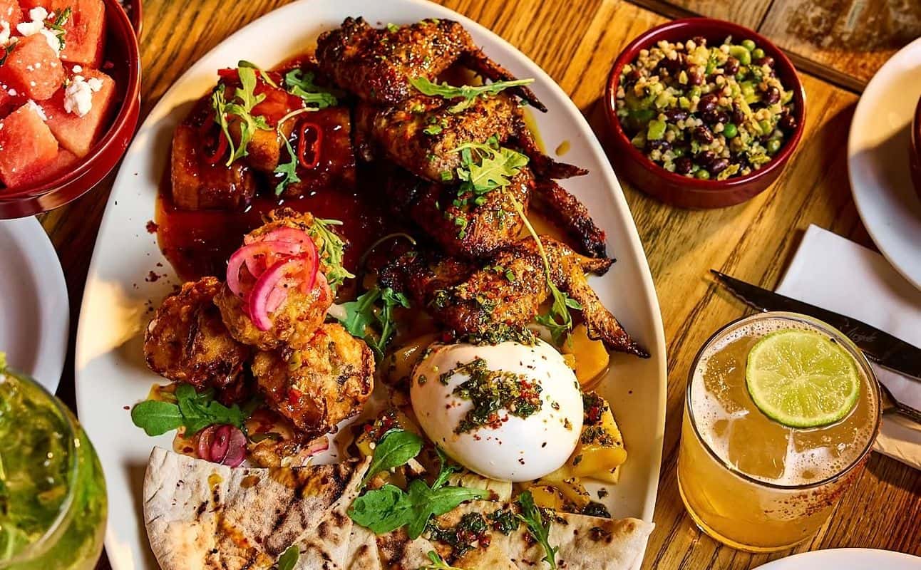Enjoy Caribbean, Vegan options, Vegetarian options, Gluten Free options, Restaurant, Free wifi, Dog friendly, Highchairs available, Indoor & outdoor seating, Table service, Wheelchair accessible, $$, Families, Groups and Kids cuisine at Turtle Bay Bath in Bath City Centre, Bath