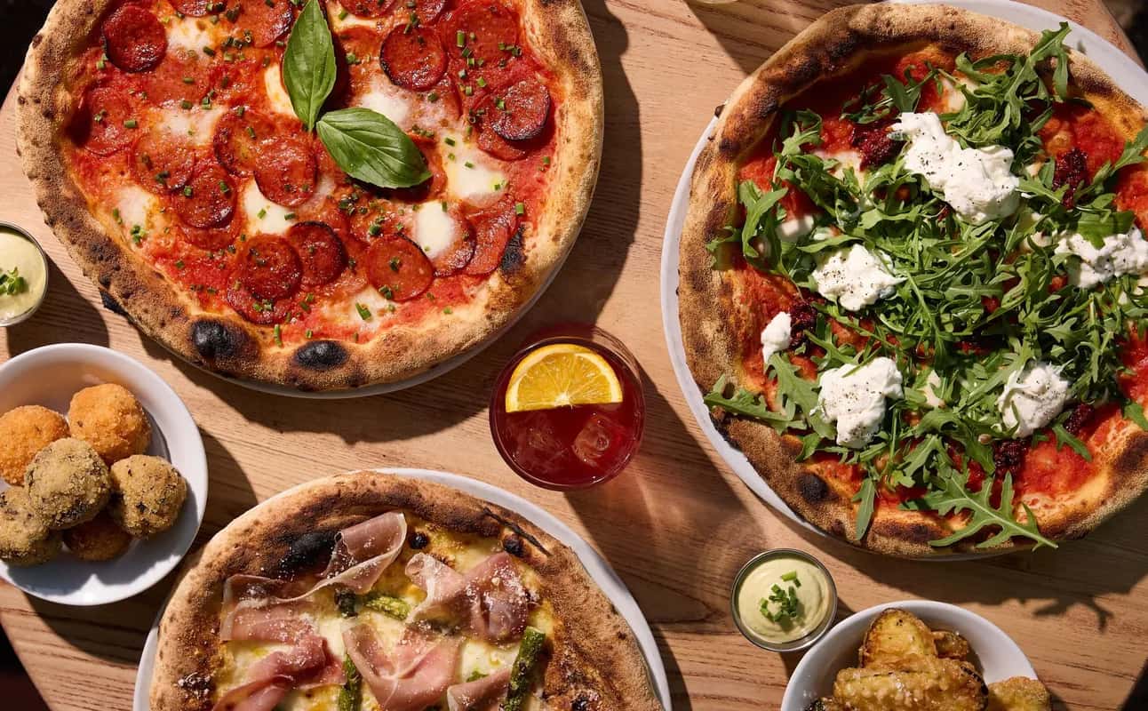 Enjoy Pizza, Italian, Restaurant, Indoor & outdoor seating, Table service, Dog friendly, $$, Families, Date night and Groups cuisine at The Hawk's Nest in Shepherd's Bush, London