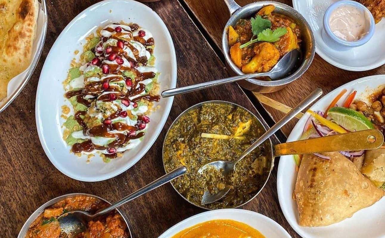 Enjoy Indian, Asian, Small plates, Vegan options, Vegetarian options, Gluten Free options, Restaurant, Cafe, Highchairs available, Table service, Wheelchair accessible, $$, Families and Groups cuisine at Mother India's Cafe in Edinburgh Old Town, Edinburgh