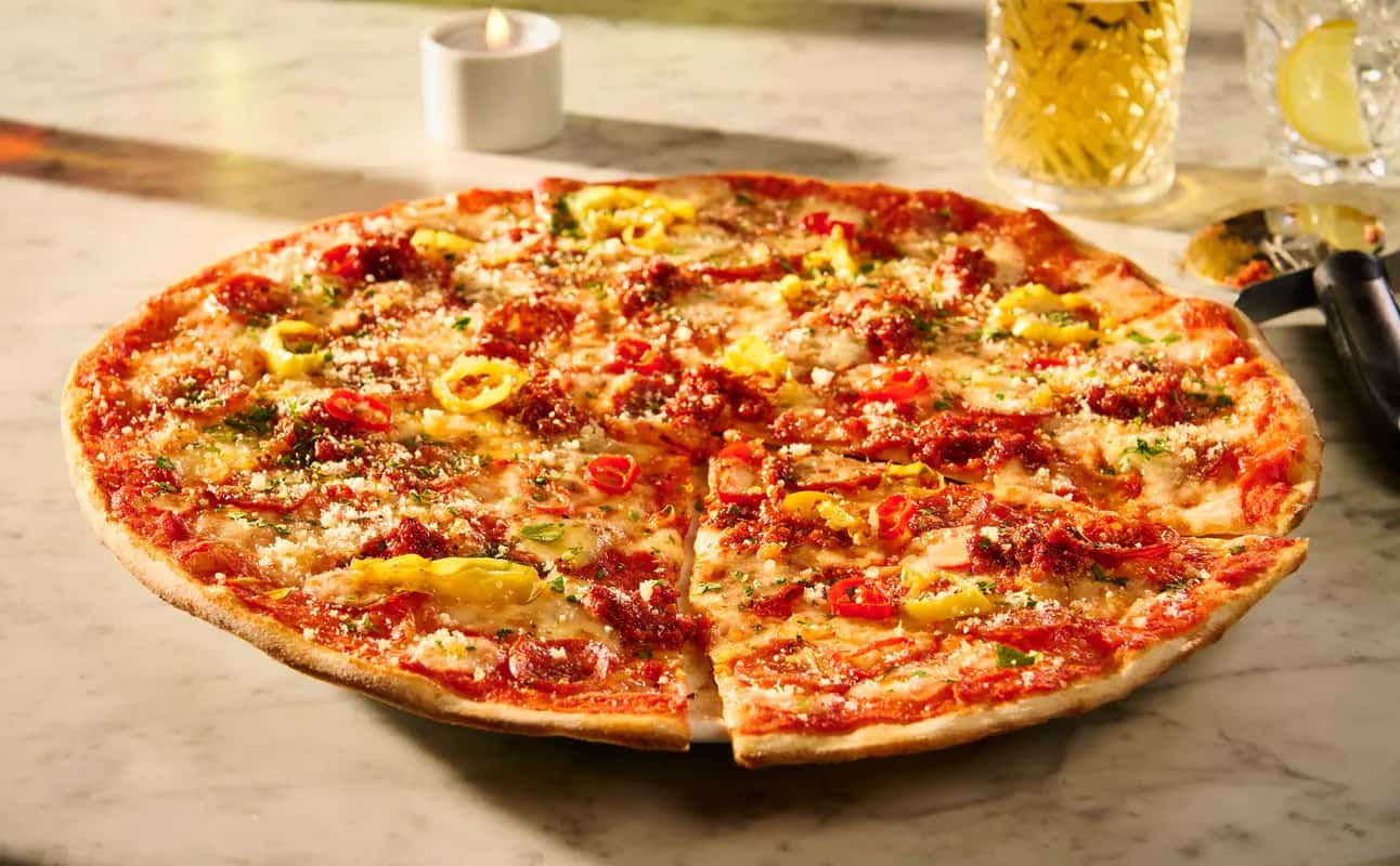 Enjoy Pizza, Casual dining, Italian, Gluten Free options, Vegan options, Vegetarian options, Dairy free options, Restaurant, Free wifi, Wheelchair accessible, Table service, Indoor & outdoor seating, Highchairs available, $$, Groups, Families and Date night cuisine at PizzaExpress Giltbrook Retail Park in Giltbrook, Nottingham