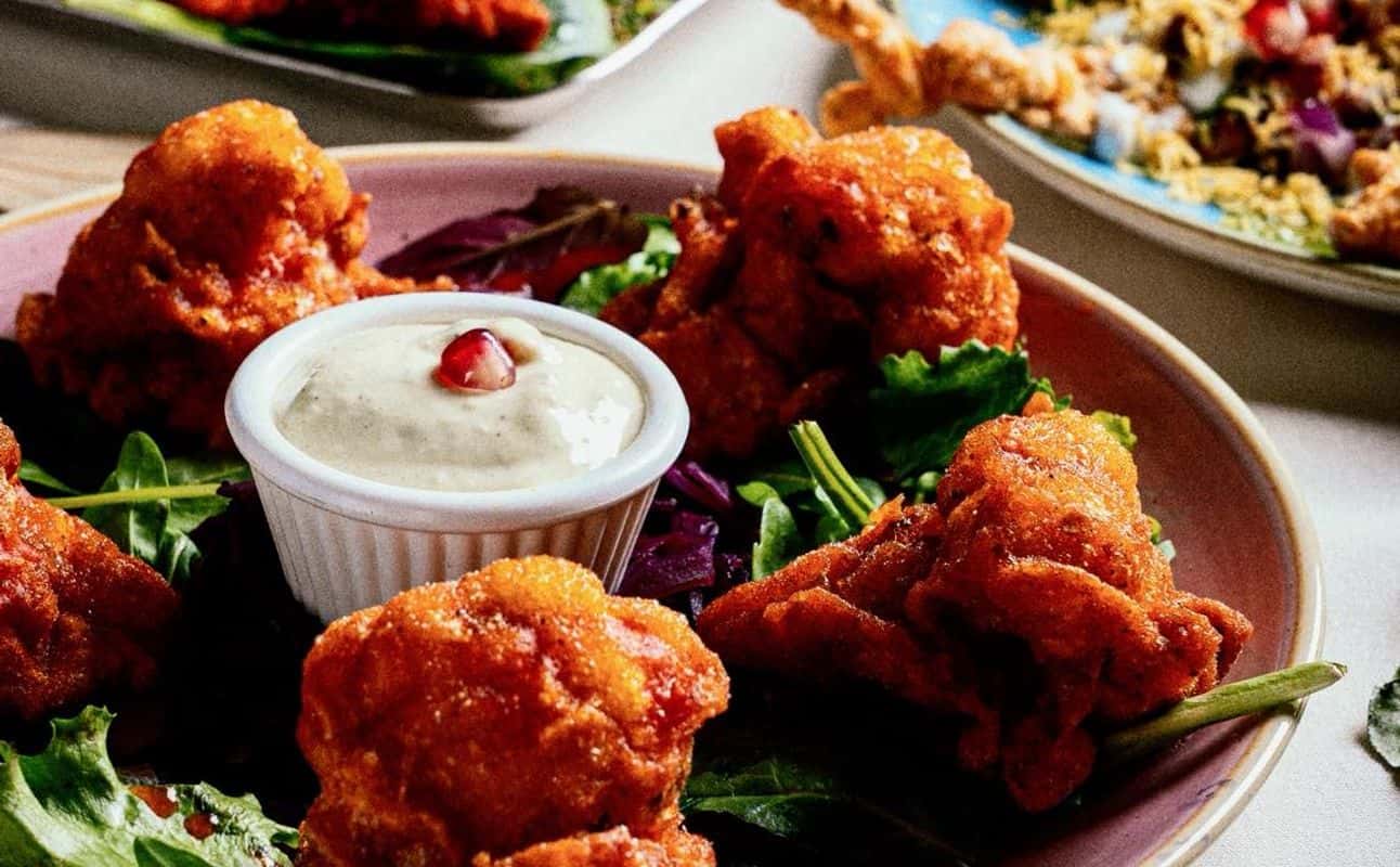 Enjoy Indian, Vegan options, Vegetarian options, Gluten Free options, Restaurant, Non-smoking, Wheelchair accessible, Highchairs available, Indoor & outdoor seating, Table service, Free wifi, Private dining, $$, Groups and Families cuisine at Namaste Village - Oxford in Oxford City Centre, Oxford