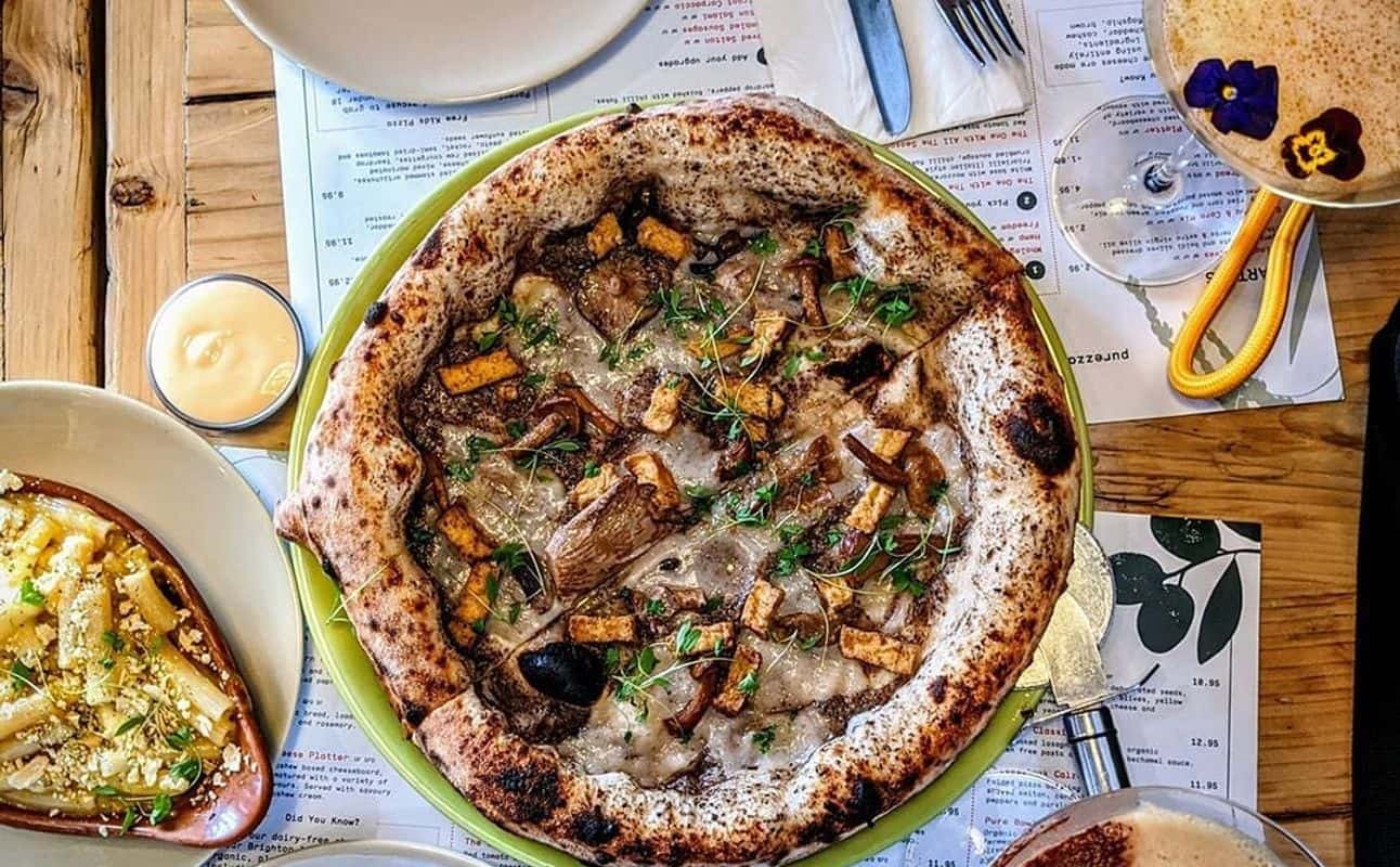 Enjoy Italian, Pizza, European, Vegan options, Gluten Free options, Restaurant, Free wifi, $$, Families and Groups cuisine at Purezza in Camden, London
