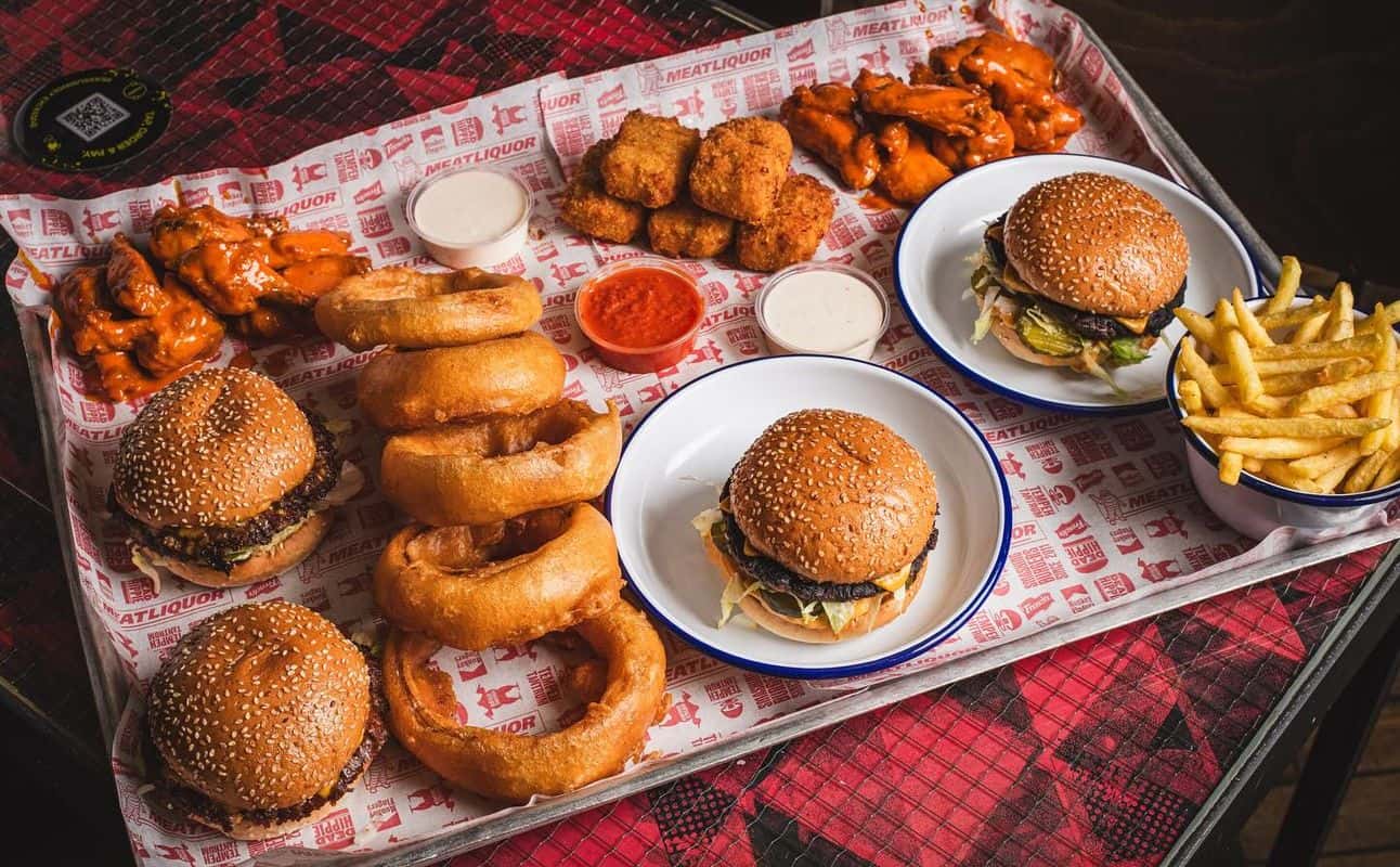 Enjoy American, Vegan options, Restaurant, Dog friendly, Street parking, Non-smoking, Table service, $$, Families, Groups and Live music cuisine at MEATliquor W1 in Oxford Circus, London