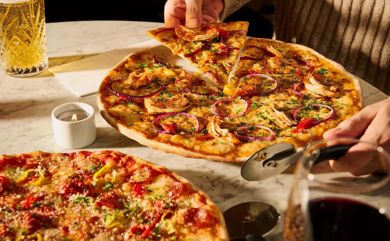 Enjoy Italian, Casual dining, Pizza, Vegan options, Gluten Free options, Dairy free options, Vegetarian options, Restaurant, Free wifi, Street parking, Wheelchair accessible, Table service, Highchairs available, $$, Families, Groups and Date night cuisine at PizzaExpress Hale Ashley Road in Hale, Manchester