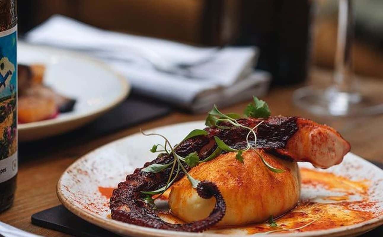 Enjoy Small plates, Spanish, Gluten Free options, Vegan options, Vegetarian options, Restaurant, Free wifi, Non-smoking, Street parking, Table service, Wheelchair accessible, Highchairs available, Indoor & outdoor seating, $$, Business meetings, Groups, Special occasion and Date night cuisine at Camino Monument in Monument, London