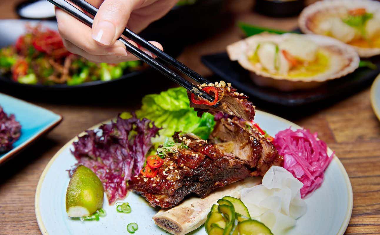 Enjoy Asian cuisine at Yuu Kitchen in Spitalfields, London